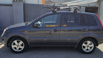 Ford Fusion bare portbagaj Menabo Tema aluminiu si suporturi de bicicleta Menabo Chrono