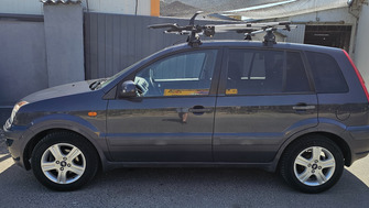 Ford Fusion bare portbagaj Menabo Tema aluminiu si suporturi de bicicleta Menabo Chrono