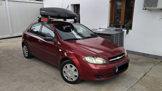 Chevrolet Lacetti bare portbagaj Menabo Tema si cutie portbagaj Menabo Marathon Dark 400