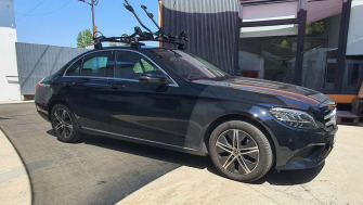 Mercedes C Class bare portbagaj Thule Evo Raised Edge Black si suporturi de bicicleta Thule ProRide 598