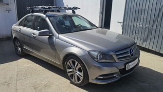 Mercedes C (W204) cu bare transversale Omega Aluminiu si suport bicicleta Thule Freeride 532