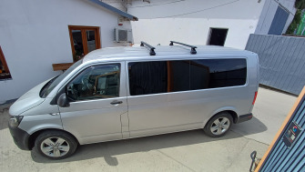 Volkswagen Caravelle (T6) cu bare transversale Menabo Omega Plus Black