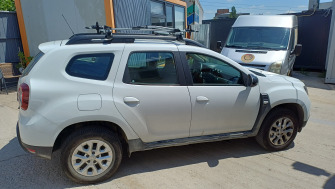 Dacia Duster II cu suport bicicleta Thule Freeride 532