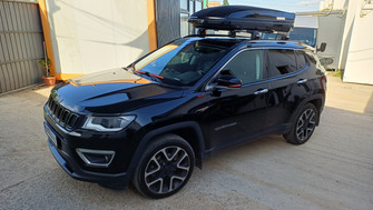 Jeep Compass with a Menabo Mania 460 DUO ABS Black roof box