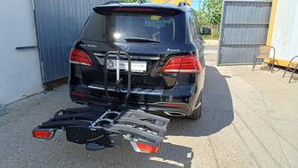 Mercedes GLEd with a Thule EasyFold XT 3 towbar bike rack