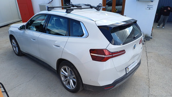 BMW X3e with Menabo Tiger Black roof bars and a Thule FreeRide 532 bike rack