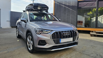 Audi Q3 2018+ with Menabo Sonic Black roof bars and a Thule Motion 3 L roof box