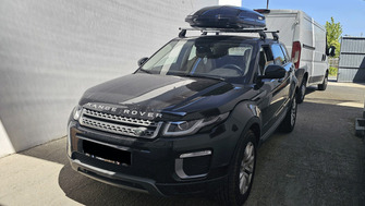 Land Rover Range Rover with Menabo Tema roof bars and a Menabo Mania 460 Black roof box
