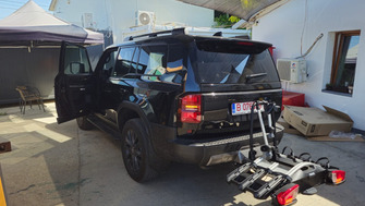 Toyota Land Cruiser with a Thule VeloCompact 926 towbar bike rack for 3 bikes