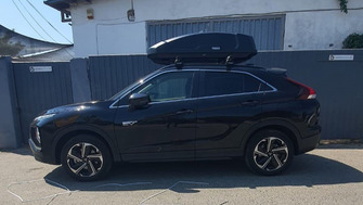 Mitsubishi Eclipse Cross with a Thule Force XT S roof box
