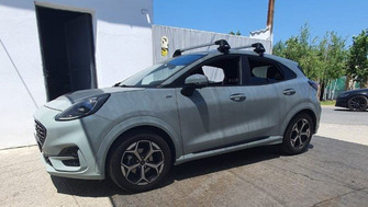 Ford Puma with Thule Edge Clamp Silver roof bars