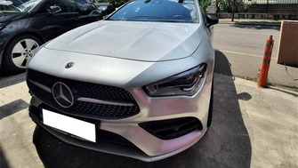Mercedes-Benz CLA with Menabo Tema roof bars and two Thule ProRide 598 bike racks