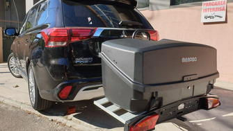 Mitsubishi Outlander with a Menabo Alcor 3 towbar bike rack and a Menabo Mizar cargo box