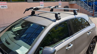 Mercedes-Benz A-Class with Menabo Tema roof bars and a Thule ProRide 598 bike rack