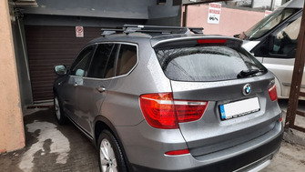 BMW X3 with Menabo Tiger Black roof bars