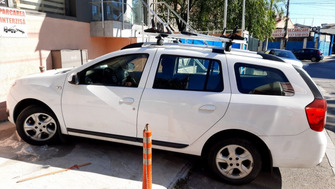 Dacia Logan MCV with Menabo Sherman roof bars and Menabo Juza bike racks