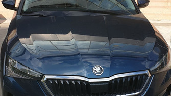 Skoda Scala with Menabo Tema roof bars and a Menabo Juza bike rack