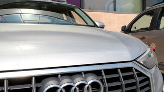 Audi A3 with Menabo Tiger Silver roof bars and a Menabo Top Bike bike rack