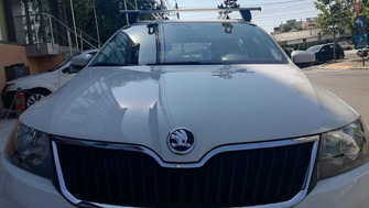 Skoda Fabia with Menabo Delta aluminium roof bars and a Thule FreeRide 532 bike rack
