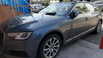 Audi A4 with Menabo Leopard Silver roof bars and Thule FreeRide bike racks