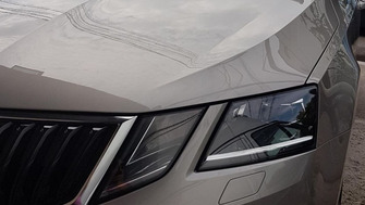 Skoda Octavia with Menabo Tema roof bars and a Menabo Juza bike rack