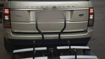 Range Rover with a Menabo Antares Plus towbar bike rack