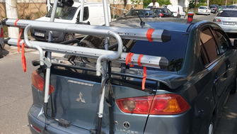 Mitsubishi Lancer with a Menabo Steel Bike rear bike rack