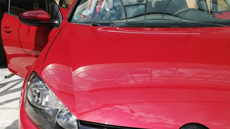 Volkswagen Golf 6 with Menabo Tema roof bars and a bike rack