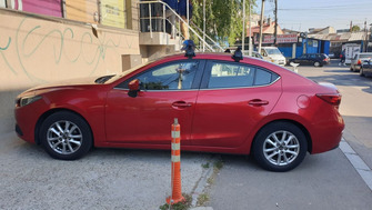 Mazda 3 with Menabo Tema roof bars