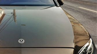 Mercedes E-Class with Menabo Tema roof bars