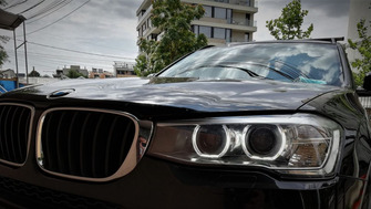 BMW X bare transversale Menabo Leopard Silver si cutie portbagaj Menabo Mania