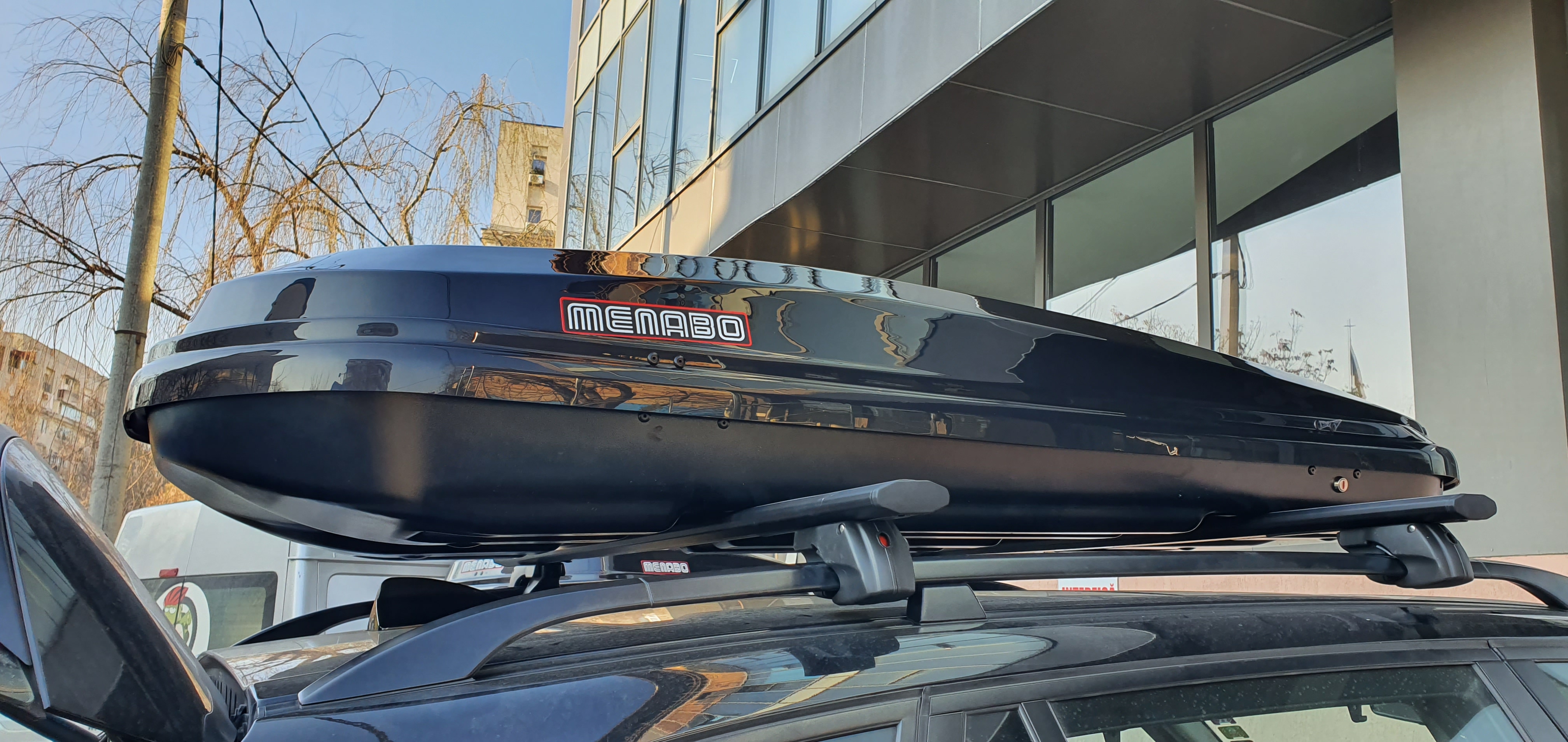BMW X5 E70 cu bare transversale Menabo Jackson si cutie portbagaj Menabo Diamond DUO 450 Black - poza 1 BMW X5 E70 cu bare transversale Menabo Jackson si cutie portbagaj Menabo Diamond DUO 450 Black - poza 1