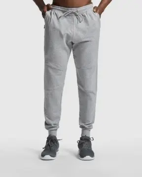 Pantaloni lungi strâmți jos, cu betelie elastică și șnur de strângere exterior