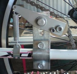 Intinzator lant bicicleta cu motor (cu arc)