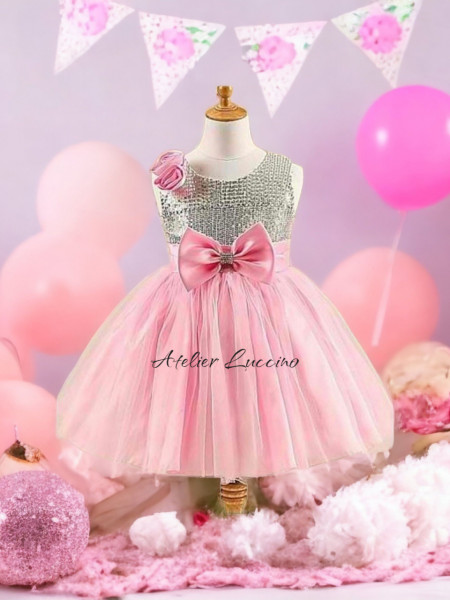 Shimmering silver dress with pink tulle and bow