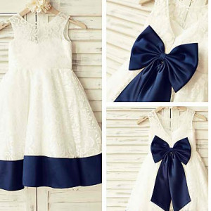 Beautiful dark blue lace dress with big satin bow