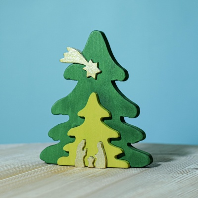 Close-up photo of the puzzle pieces, highlighting the intricate laser-cut details and golden finish.
