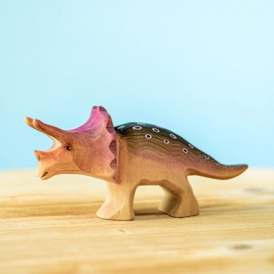 Handcrafted wooden Triceratops dinosaur figurine