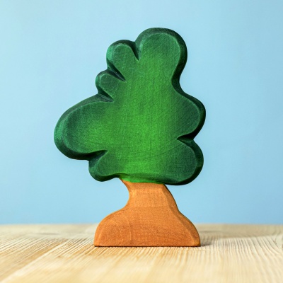 Close-up of the wooden tree, highlighting the natural wood grain and variations in the hand-applied stain.