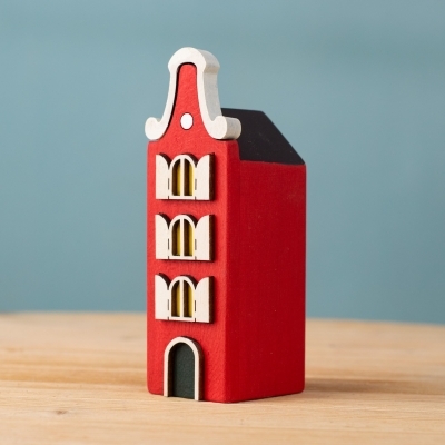 Red Antwerp House with arched windows.