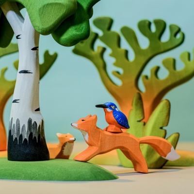 Imaginative Play with Large and Small Wooden Dino Trees