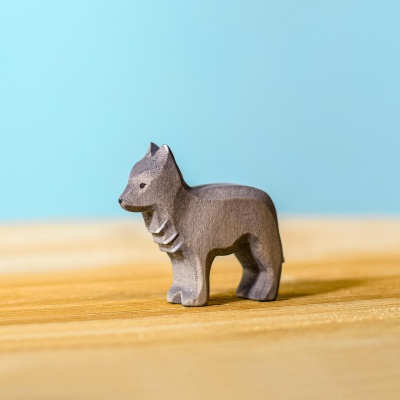 Close-up of the wooden Wolf Cub, showcasing non-toxic, safe materials