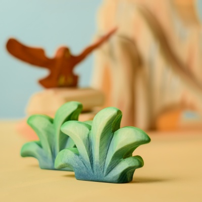 Mountain Bush in a play scene with other wooden toys.