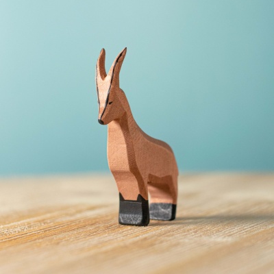 BumbuToys' handcrafted Mountain Goat, a wooden figure poised for alpine adventures