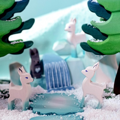White Blue Fawn from BumbuToys, a handcrafted figure that embodies the wonder of the wild