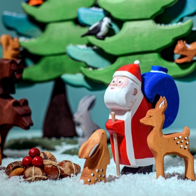 Fawn wooden toy shown beside a ruler highlighting its small size.