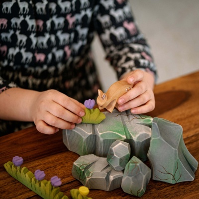 Small eco-friendly wooden toy with LILA flower.