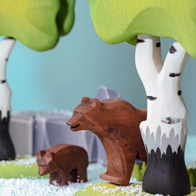 The Large Birch Green, a hand-painted wonder, stands tall amidst the wooden flora of BumbuToys.