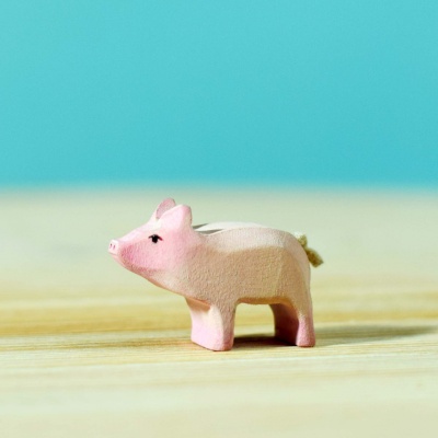 Handmade wooden Piglet Standing toy by BumbuToys, perfect for storytelling