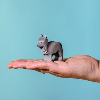 Child engaging with the eco-friendly Wolf Cub toy for imaginative play